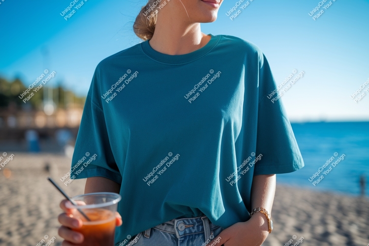 Teal shirt beach drink ocean