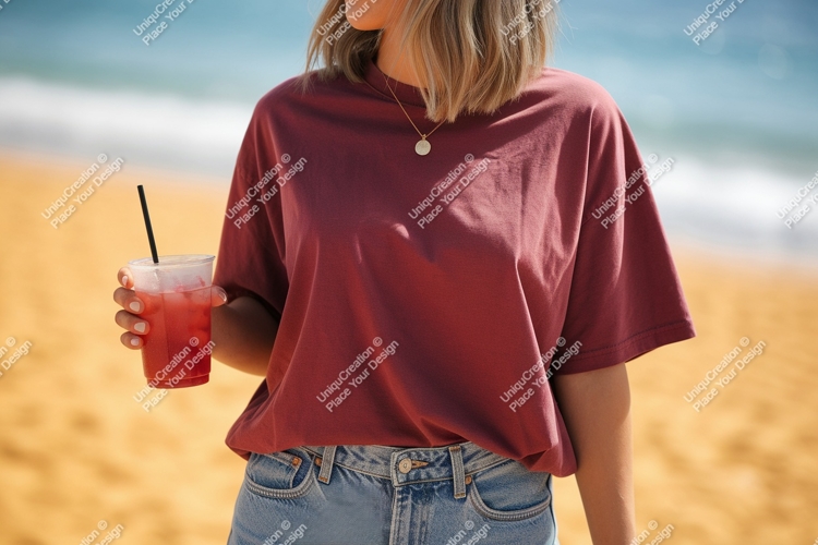Maroon shirt denim jeans holding pink drink image