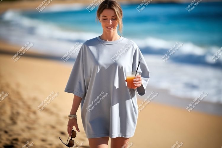 Woman holding drink and sunglasses on beach ocean sand