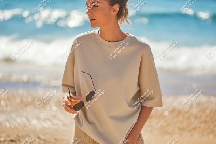 Woman holding drink sunglasses beach ocean