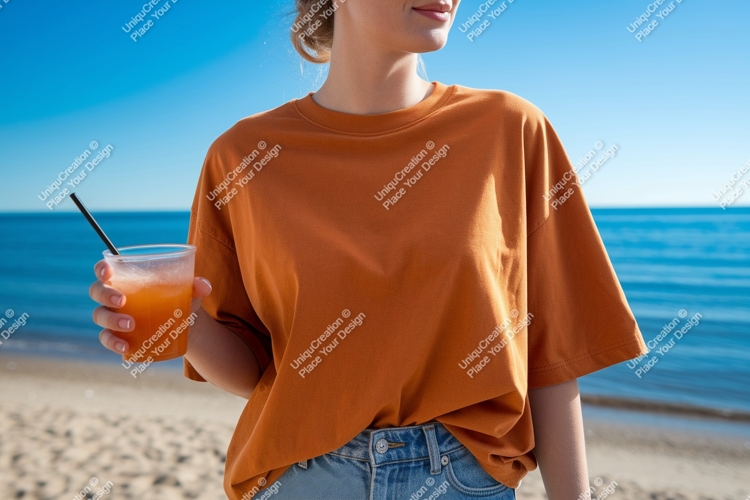 Orange shirt denim jeans holding drink image
