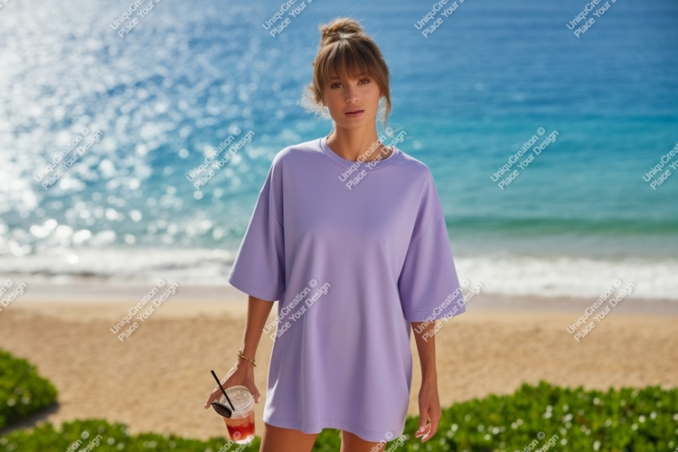 Woman wearing lavender t shirt holding drink image