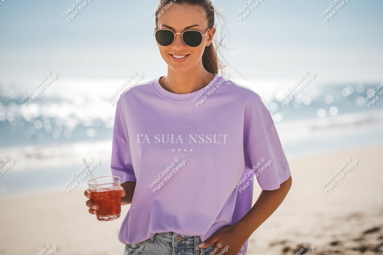 Woman wearing lavender t shirt holding drink t-shirt