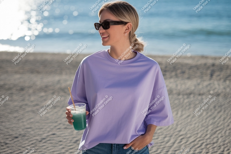 Woman wearing lavender t shirt holding drink image