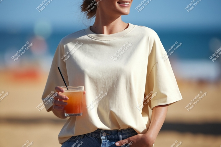 Woman holding drink on beach summer casual
