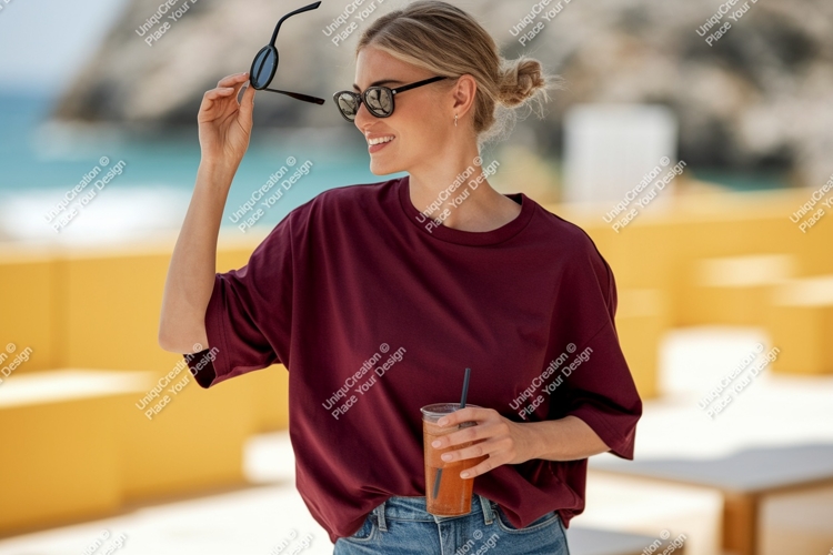 Woman holding sunglasses with drink t-shirt jeans