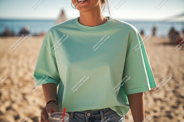 Mint green t shirt on beach image