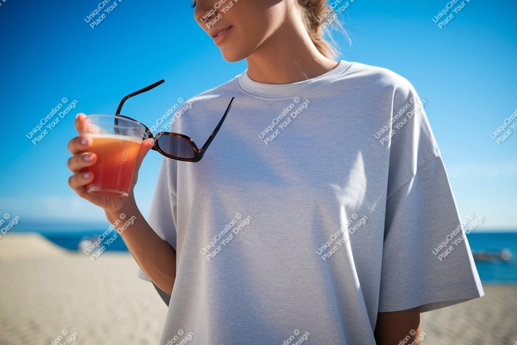 Woman holding drink sunglasses beach image