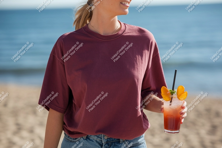 Woman holding drink on beach cocktail summer
