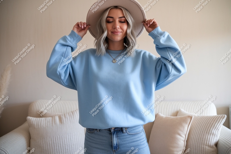 Woman wearing blue sweatshirt and hat casual