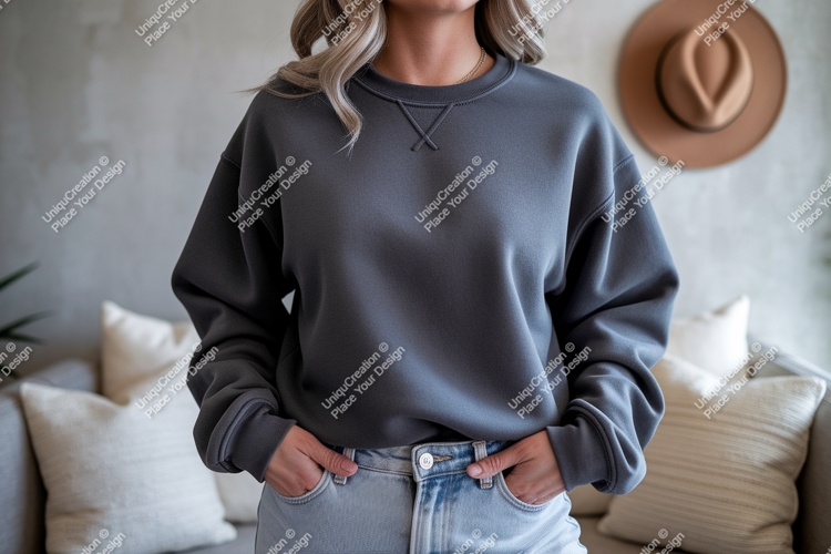 Charcoal gray sweatshirt with denim jeans
