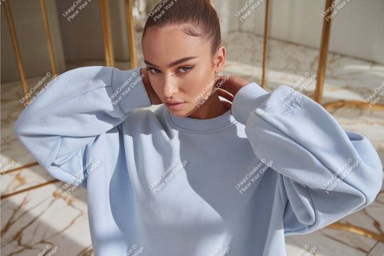 Woman poses in blue sweatshirt mockup