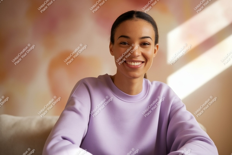 Smiling woman wearing lavender sweatshirt indoor