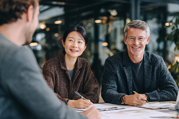Smiling Business Team Meeting Together