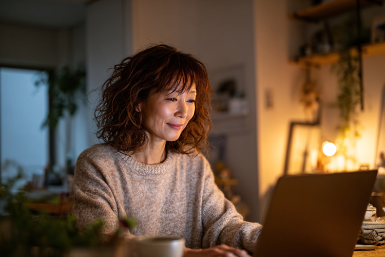 Young Woman Working Late on Laptop