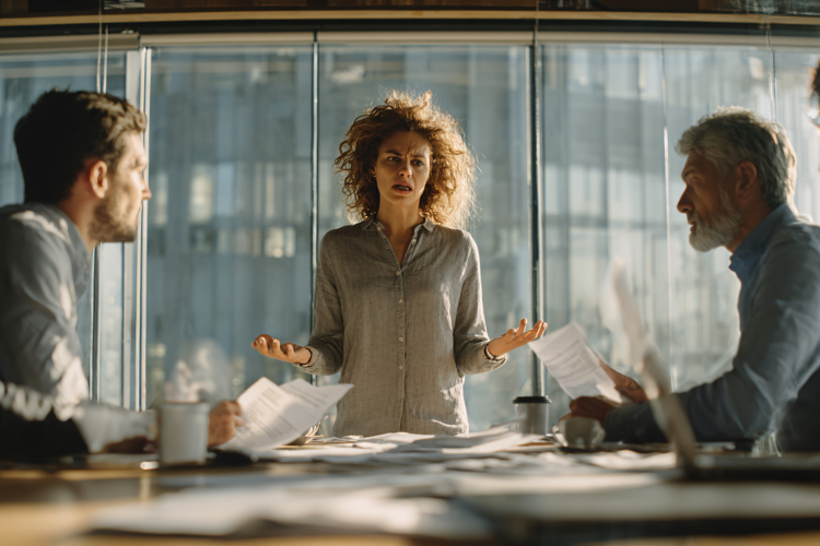 Business Team Meeting with Woman Presenting