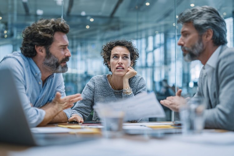 Business Team Conflict During Meeting example image 1