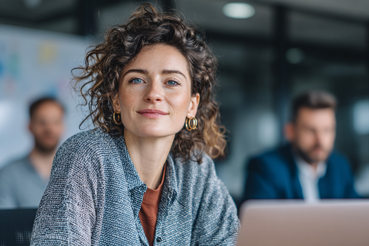 Confident Woman at Office Team Meeting