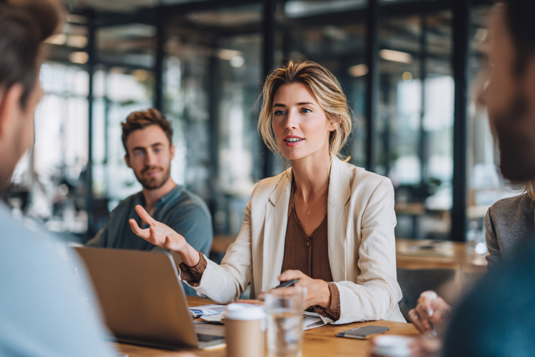 Woman Leading Conference Table Meeting