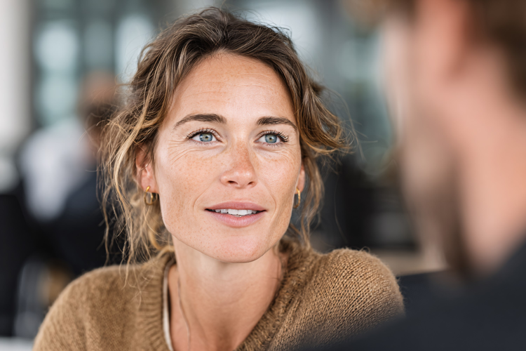 Woman Listening During Office Meeting