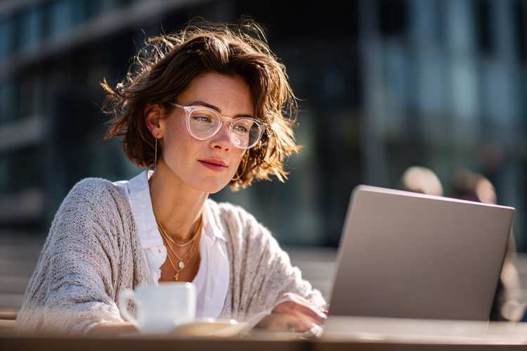 Woman Working Outdoors in Sunlight