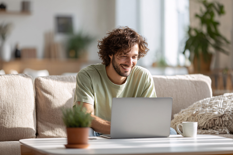 Smiling Man Working from Home Office