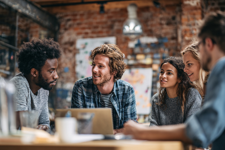 Diverse Business Team Laughing in Meeting