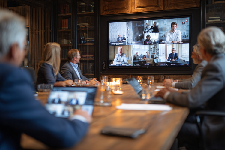 Business Team in Glass Meeting Room