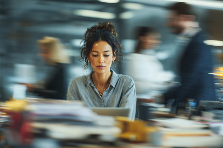 Woman Working on Laptop in Warm Office