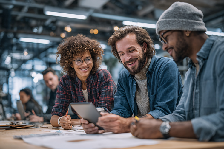 Businessman Smiling During Team Meeting