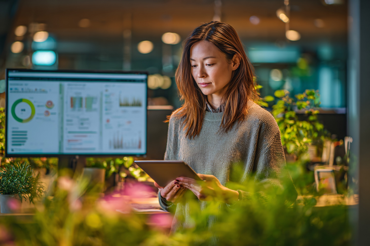 Focused Woman Working in Busy Office