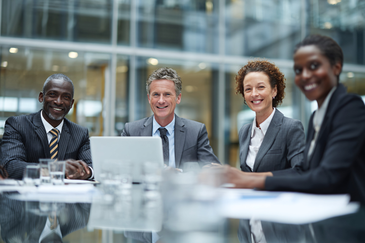 Diverse Business Team Smiling in Meeting