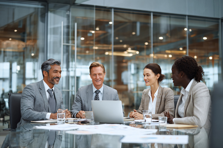 Diverse Team Meeting in Glass Conference Room