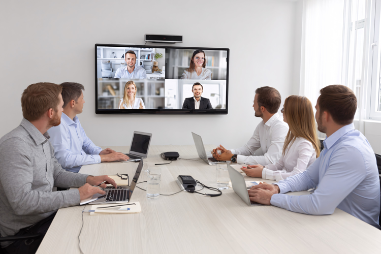Diverse Business Team Video Conferencing in Modern Office