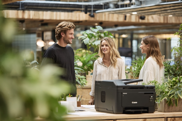 Office Team Collaborating by Printer, Happy People in Modern