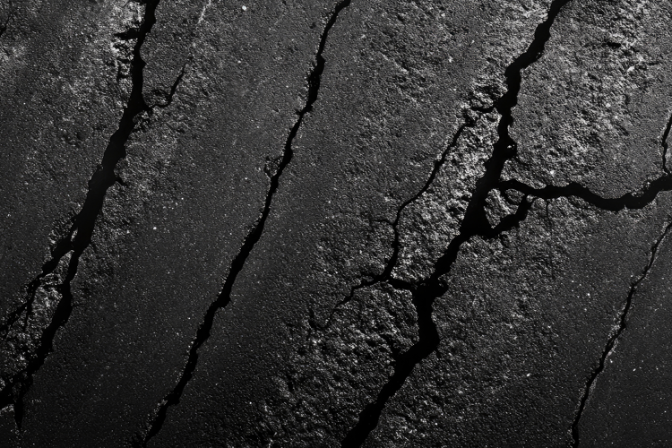 Cracked Asphalt Texture Background Wallpaper