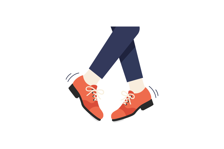Stylish red shoes on a person walking confidently in a flat