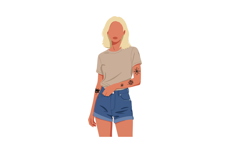 Stylish woman in casual outfit with tattoos showcasing minim