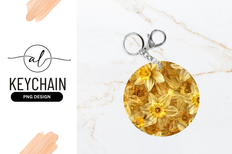 Round keychain with yellow daffodil design