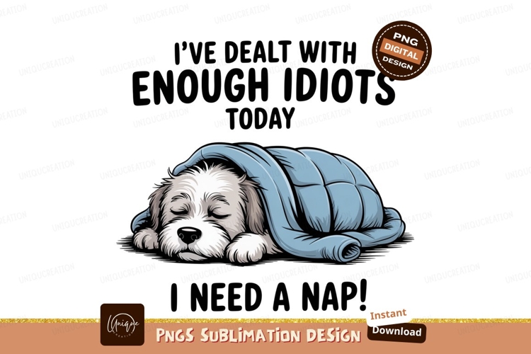 Fluffy dog sleeping under blue blanket puppy