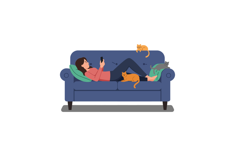 Person relaxing on a couch with multiple cats around them