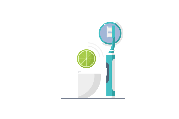 Electric toothbrush with lime slice and white cup in minimal