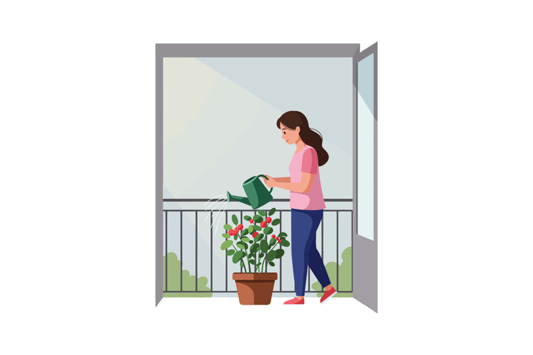 Woman in a pink shirt watering her flowering plant on a balc