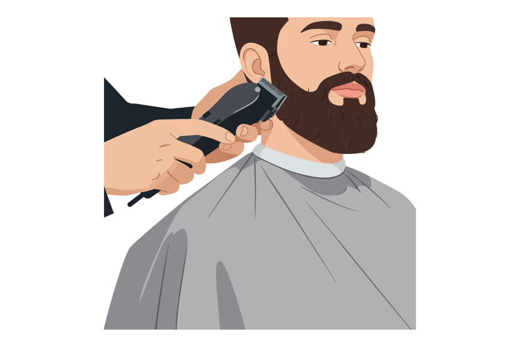 Man getting beard trimmed with electric clipper at barbersho