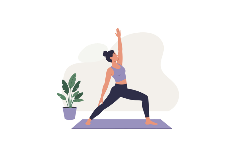 Woman practicing yoga in warrior pose on mat with indoor pla