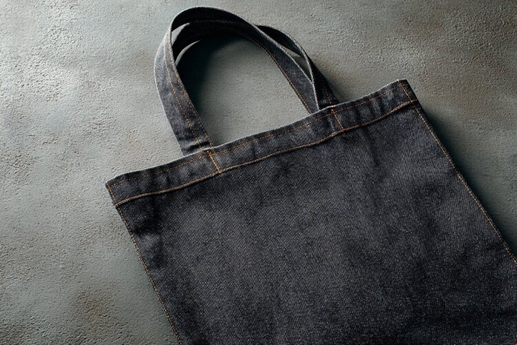 Black Denim Tote Bag on Concrete example image 1