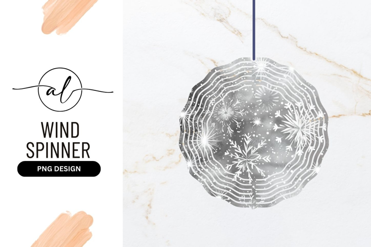Round wind spinner with snowflake design
