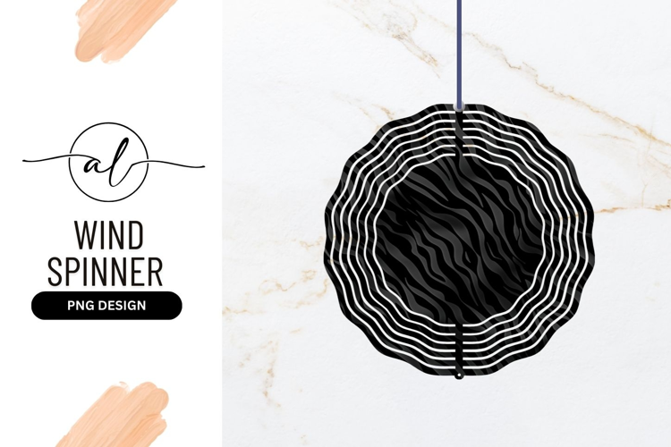 Round wind spinner with zebra print design