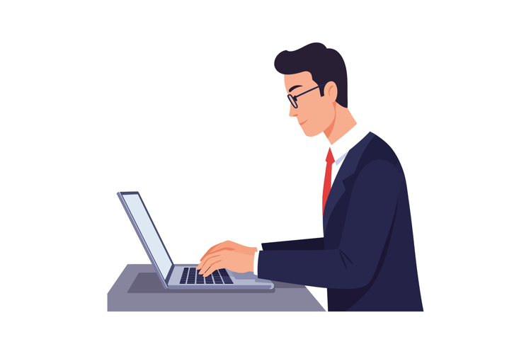 Professional man in a suit focused on typing at a laptop in